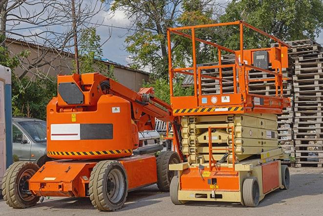 forklift moving pallets of inventory in a warehouse in Kentfield, CA